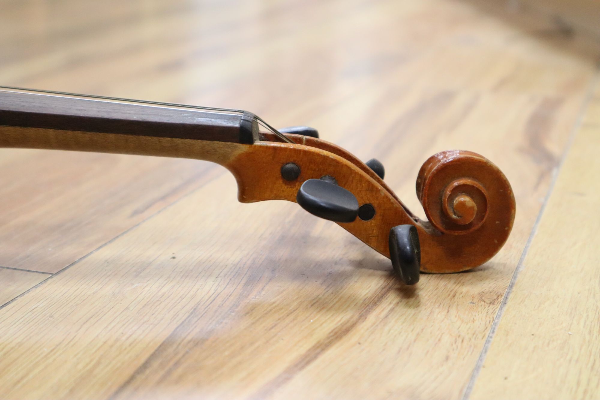 A 3/4 size violin, labelled Stradavarius, cased